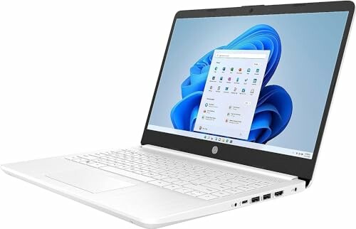 White laptop displaying Windows screen.